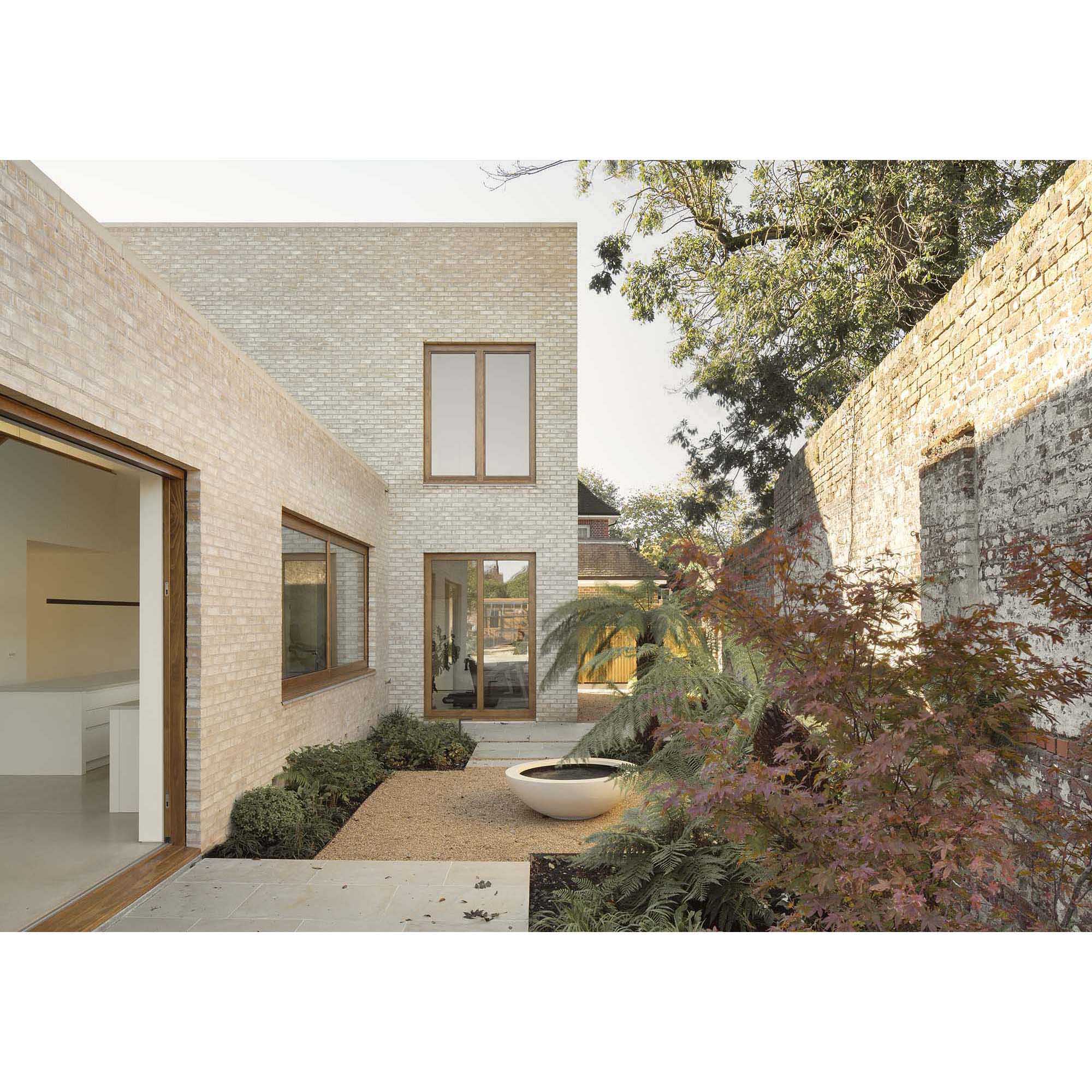 Erbar Mattes Architects Wimbledon custom new build timber frame house garden side view